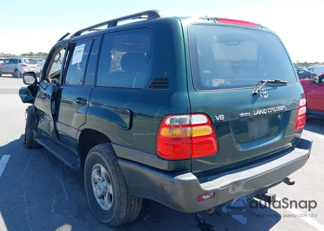1999 Toyota Land Cruiser z USA, uszkodzony, nr VIN JT3HT05J0X0042971